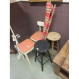 A pair of wooden stools together with a four pole wind break, painted stool and one similar seat
