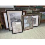 A collection of seven framed and glazed prints and maps