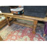 A waxed pine rectangular dining table