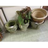 A selection of weathered garden pots together with a metalwork bucket