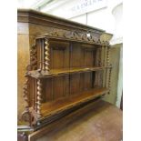 A 19th century set of wall hanging shelves with barley twist supports