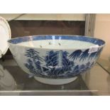 A large blue and white oriental ceramic bowl (A/F)Diameter: 37cm