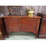 An early 20th century mahogany two door cabinet