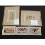 Two framed and glazed WWI needlework cards along with two others