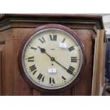 A walnut cased circular wall clock