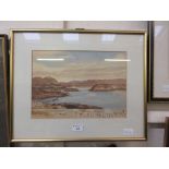 A framed and glazed watercolour of lake scene signed Singleton 1969