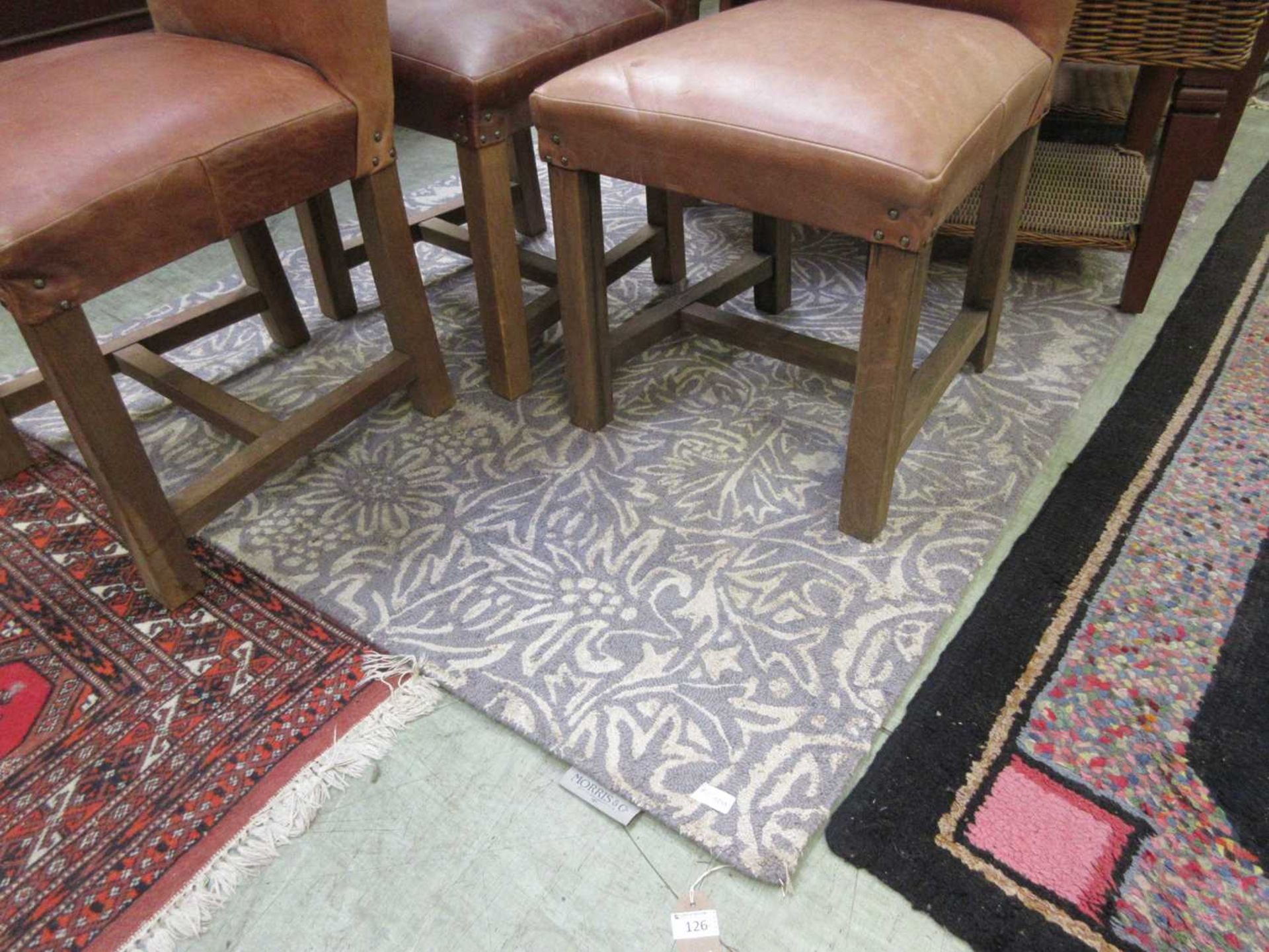 A modern floral rug by Morris and Co