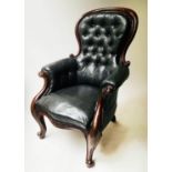 SPOONBACK ARMCHAIR, Victorian mahogany, retaining Victorian leather cloth upholstery with buttoned