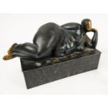 MANNER OF HENRY MOORE, 'Reclining bronze', 30cm W.