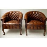 TUB ARMCHAIRS, a pair, Edwardian, buttoned antique leather, with curved backs and cabriole supports,