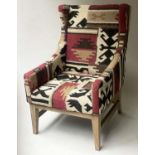 KELIM WING ARMCHAIR, with square section stretchered supports, 70cm W.