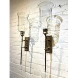 STORM LANTERNS, a pair, Regency design wall mounted, silvered metal with glass shades. 72cm H (2)