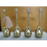 CANDLESTICKS, a set of four, 31cm H, surrealist style, ostrich egg and foot design. (4)