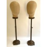 MANNEQUIN HEADS, a pair, on stands, 61cm x 14cm, French style. (2)