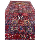 ANTIQUE PERSIAN BAKHTIARI CARPET, 350cm x 220cm.