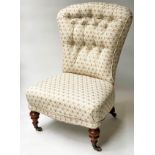 SLIPPER CHAIR, Victorian walnut with buttoned silk trellis and turned feet, 52cm W
