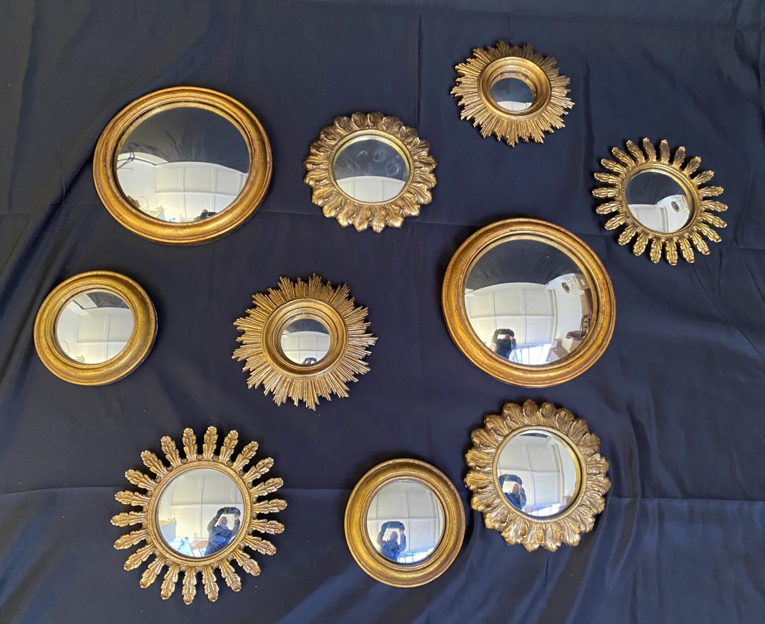 CONVEX MIRRORS, ten, gilt frames, various sizes, 26cm diam at largest. (10)