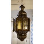 MOROCCAN HANGING LANTERNS, four, pierced metal and coloured glass, 60cm H. (4)