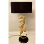 TABLE LAMP, scroll leaf gilt metal base, 102cm x 49cm x 21cm.