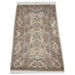 FINE PURE SILK HEREKE RUG, 105cm x 70cm.