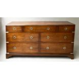 CAMPAIGN LOW CHEST, Georgian design figured yew and brass bound with seven drawers, 153cm x 46cm x