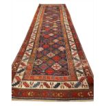 ANTIQUE NORTH WEST PERSIAN RUNNER, 365cm x 105cm.