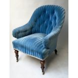 ARMCHAIR, Victorian mahogany with buttoned royal blue cut striped velvet with castors, 70cm W.