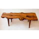 RUSTIC COFFEE TABLE, 1970s burr yewwood tree section, 109cm W x 43cm D x 40cm H.