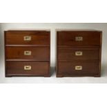 BEDSIDE CHESTS, a pair, Campaign style oak and brass bound, each with three drawers, 58cm x 35cm x