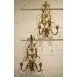WALL LIGHTS, 56cm H x 33cm, a pair, 20th century Italian gilt metal of three sconces hung with glass