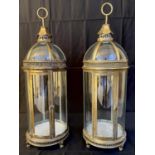 LANTERNS, a pair, in the Regency style with gilt metal frames, single door, 80cm H x 28cm diam. (2)