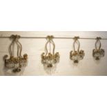 WALL LIGHTS, 48cm H x 30cm, a set of four, mid 20th century Italian gilt metal and glass with triple