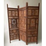 SCREEN, two fold Moorish style carved teak of three panels each 184cm H x 51cm.