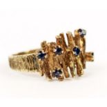 COCKTAIL RING, London 1970, 9ct gold and sapphire of brutalist design, size O.