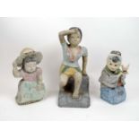 ASIAN POLYCHROME PAINTED FIGURES, a set of three, a boy, a girl and a seated lady. (3)