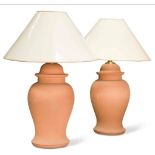 TERRACOTTA TEMPLE JAR LAMPS, a pair, with shades, 64cm x 30cm. (2)