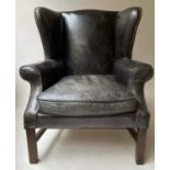 WING ARMCHAIR, Timothy Oulton waxed grey/black brass studded leather and stretchered supports,