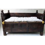 INDIAN SETTLE, North Indian teak and iron bound with rising seat and cushion, 140cm x 75cm x 90cm H.