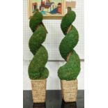 FAUX TWISTING TREES, a pair, each 82cm H. (2)