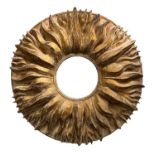 SUNBURST WALL MIRROR, of substantial size, gilt plaster frame with a bevelled circular plate,