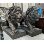 SCULPTURAL ROARING LIONS, a pair, 46cm H, faux metal, gilt finish. (2)
