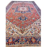 ANTIQUE PERSIAN HERIZ CARPET, 580cm x 315cm.