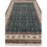 FINE PURE SILK HEREKE RUG, 241cm x 154cm.