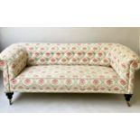 CHESTERFIELD SOFA, Victorian style with rounded back and arms in printed cotton in the manner of