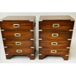 CAMPAIGN STYLE BEDSIDE CHESTS, a pair, mahogany and brass bound, each with four drawers, 46cm W x