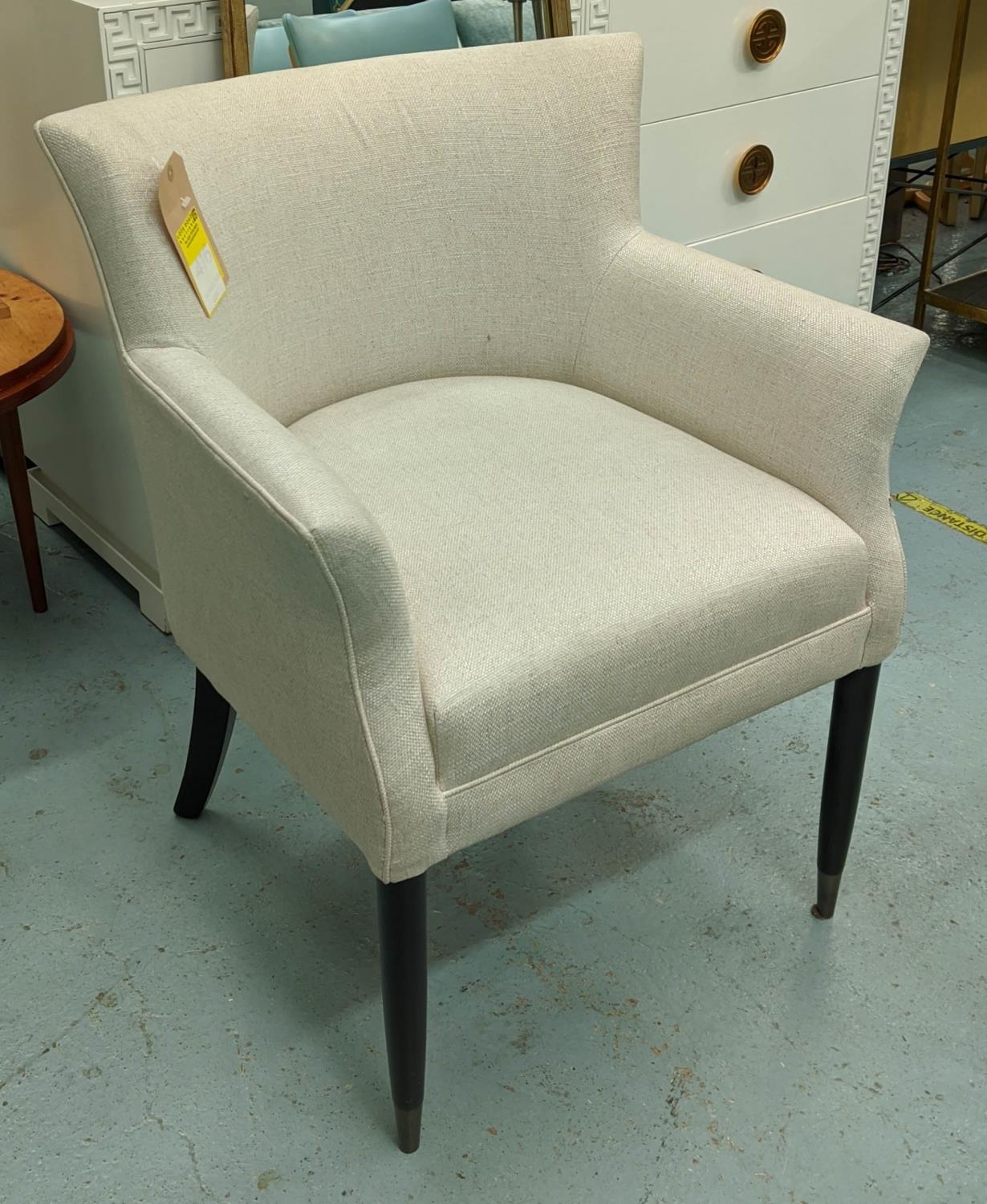 ARMCHAIR, 82cm H, white fabric upholstered, ebonised legs.