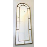 ARCHITECTURAL HALL MIRROR, Regency style, arched gilt metal frame, 180cm x 63cm.