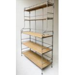 BAKERS RACK, 20th century French wrought iron with cane and wicker panelled shelves, 90cm x 36cm x