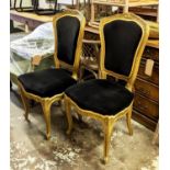 SALON CHAIRS, a pair, 48cm W x 101cm H early 20th century French giltwood with black velvet