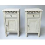 BEDSIDE CABINETS, a pair, French style grey painted each with pierced frieze, drawer and door,